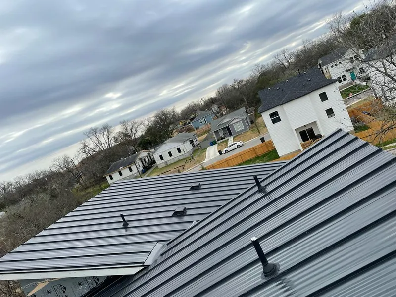 Standing seam metal roof panels with vents for Skylight Repair in Merrill